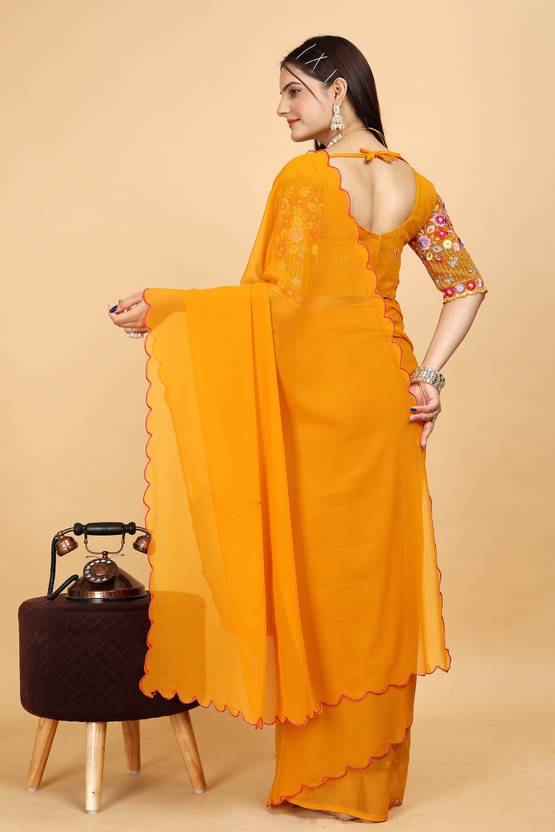 Radiant Mustard Yellow Georgette Saree with Scalloped Border