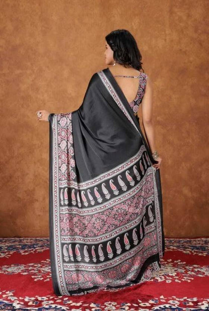 Classic Black Saree with Intricate Traditional Motif Border