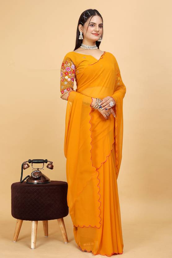 Radiant Mustard Yellow Georgette Saree with Scalloped Border