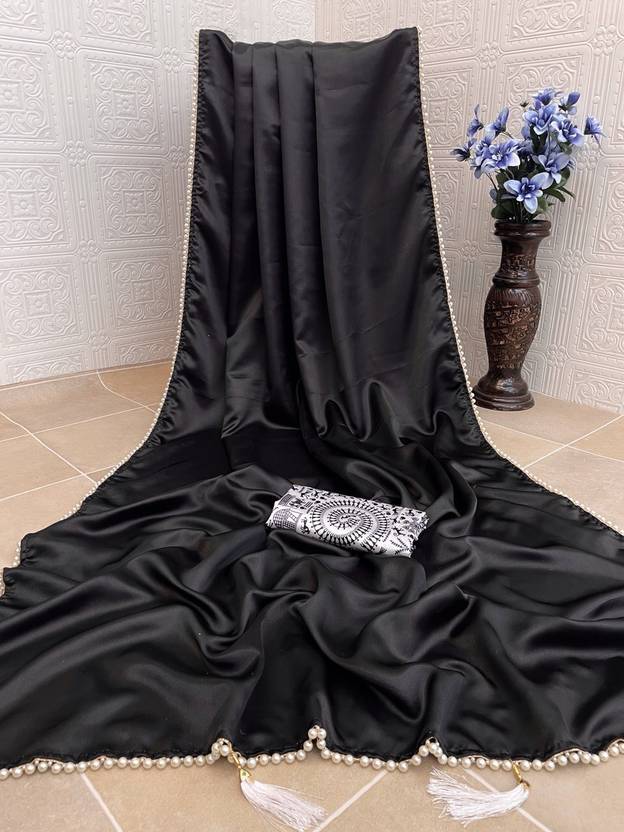 Elegant Black Striped Sheer Saree with Contemporary Drape