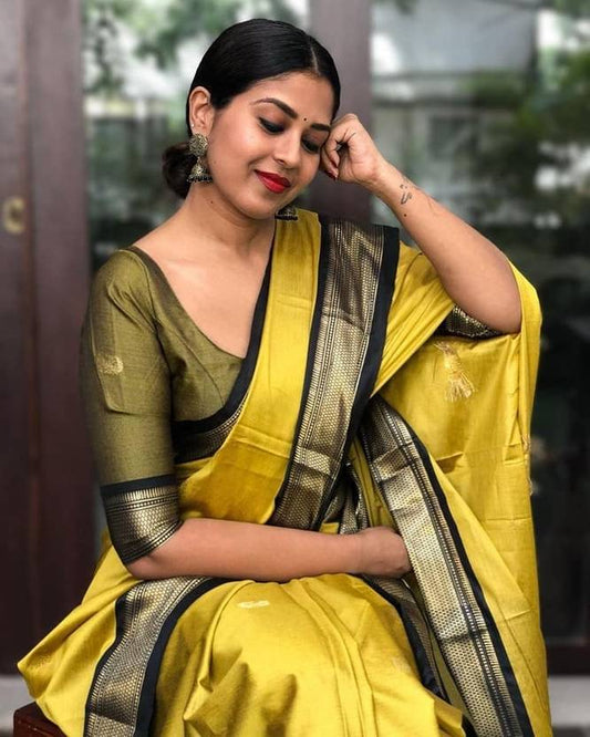 Graceful Yellow and Olive Silk Saree with Classic Border