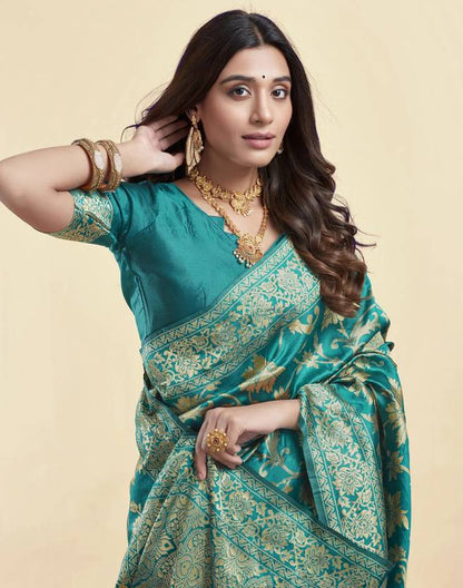 Ethereal Teal Banarasi Silk Saree with Antique Gold Floral Jaal and Intricate Pallu